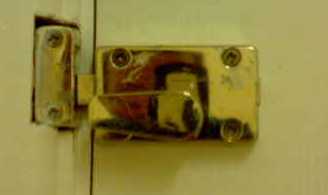 Picture of a simple, brass door lock