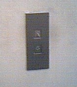 Picture of a pair of lift buttons for up and down.