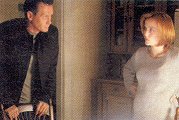 [Doggett and pregnant Scully]